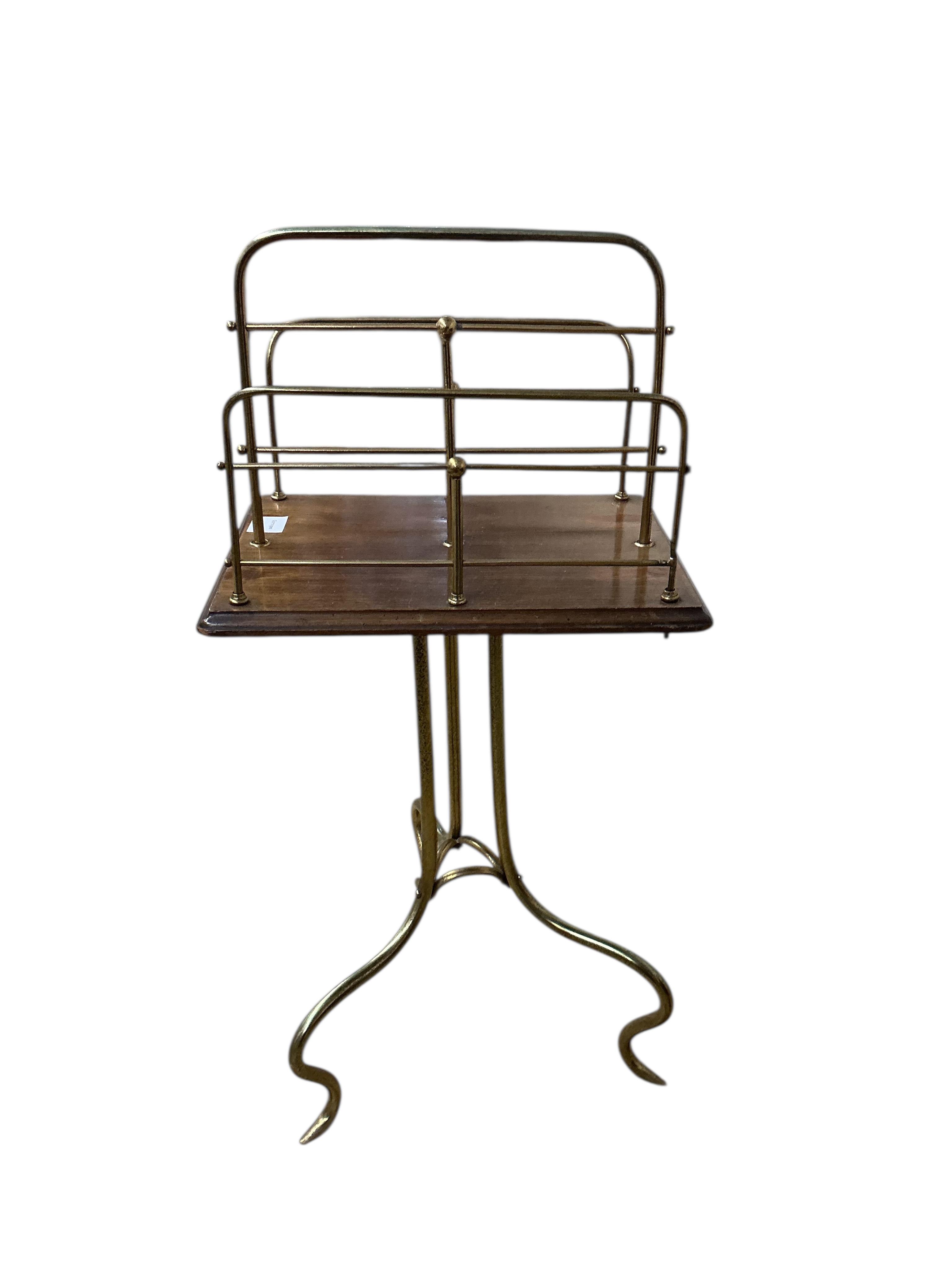 An Edwardian mahogany and tubular brass two division revolving magazine stand, width 40cm, depth 28cm, height 82cm